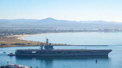 Carrier USS Abraham Lincoln deploys from San Diego with little fanfare
